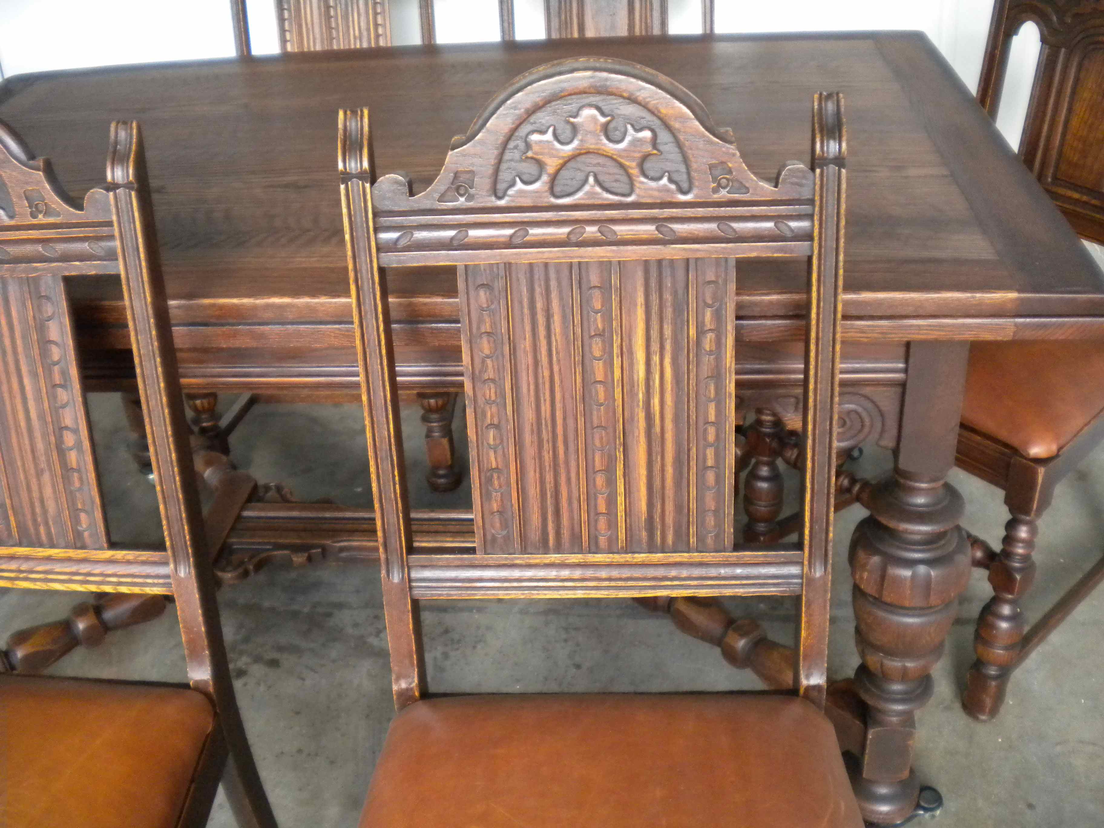 Antique English Oak Dining Table and 6 chairs with leather bottoms